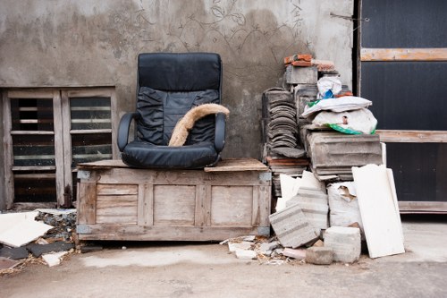 Variety of furniture pieces ready for donation or recycling in Docklands